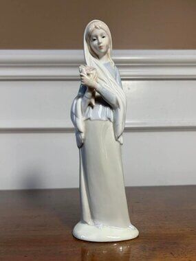 Girl with lilies porcelain figurine